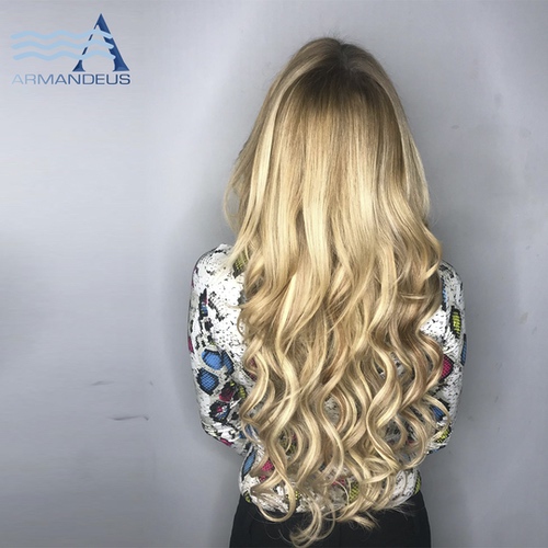 Hair extensions and color done at Salon Armandeus Doral