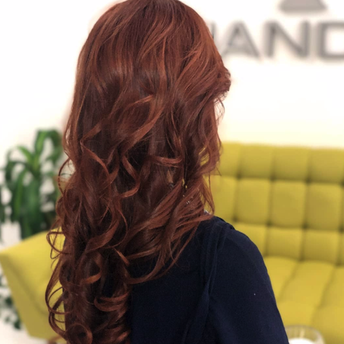 Red hair color done at Salon Armandeus Coconut Creek