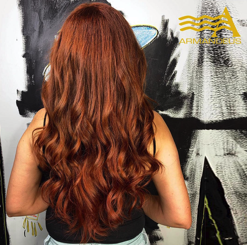 Copper hair color and style done at Salon Armandeus Doral