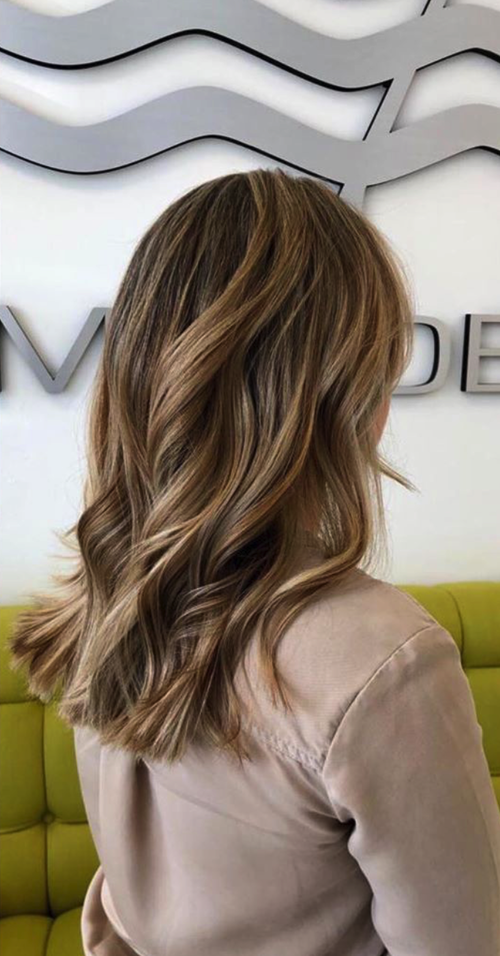 Hair color and beach waves done at Salon Armandeus Coconut Creek