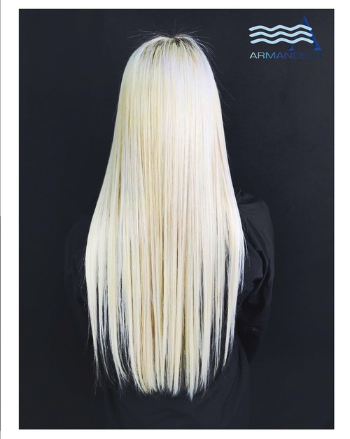 Platinum blonde and hair extensions done at Salon Armandeus Doral