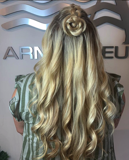 Platinum blonde and braided hairstyle by Salon Armandeus Orlando
