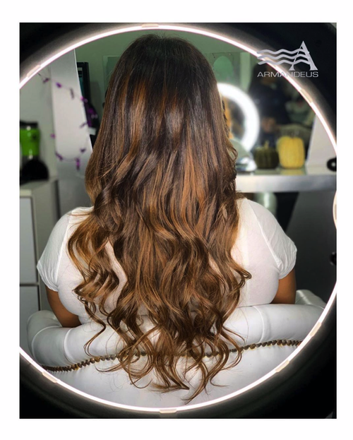 Caramel balayage is a great option for a small change visit us at hair salon Armandeus Doral to get yours