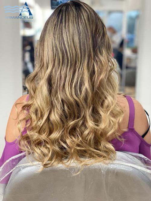 At hair salon Armandeus Weston baby highlights and beach waves are the perfect style