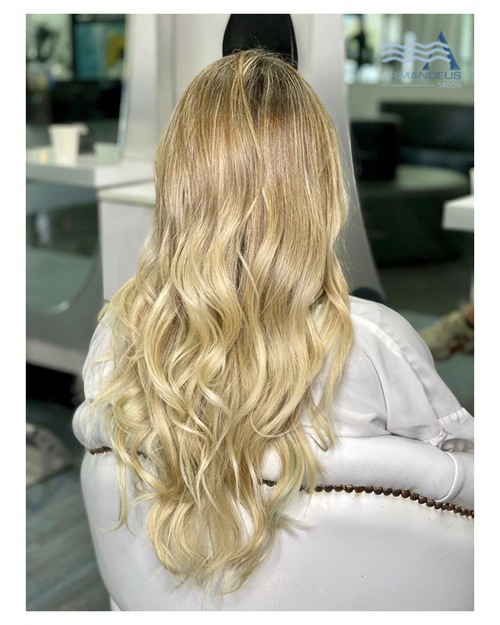 If you're looking for a perfect blonde visit us at hair salon Armandeus Doral